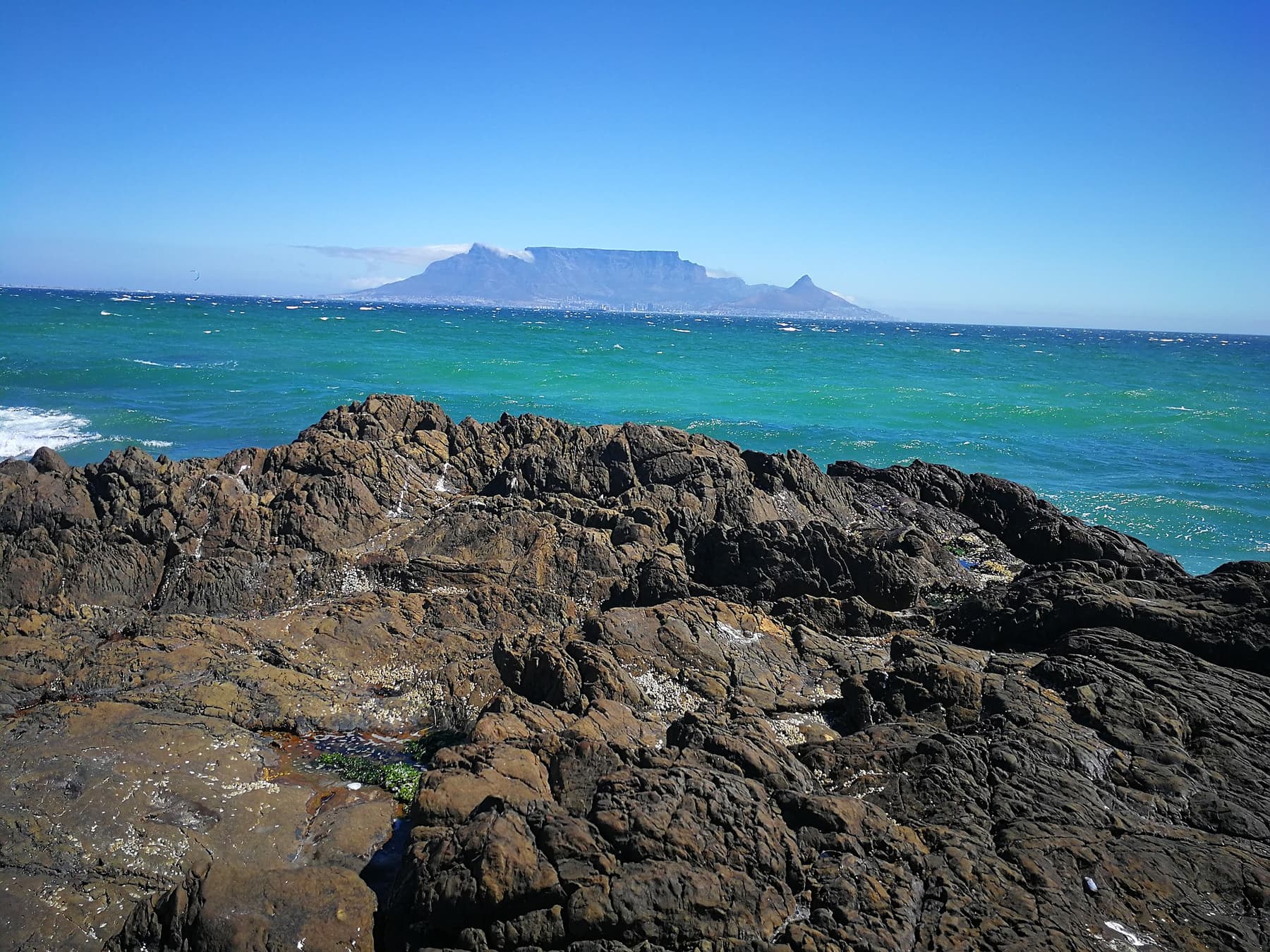 Table Mountain seen across the bay from Bloubergstrand, Cape Town