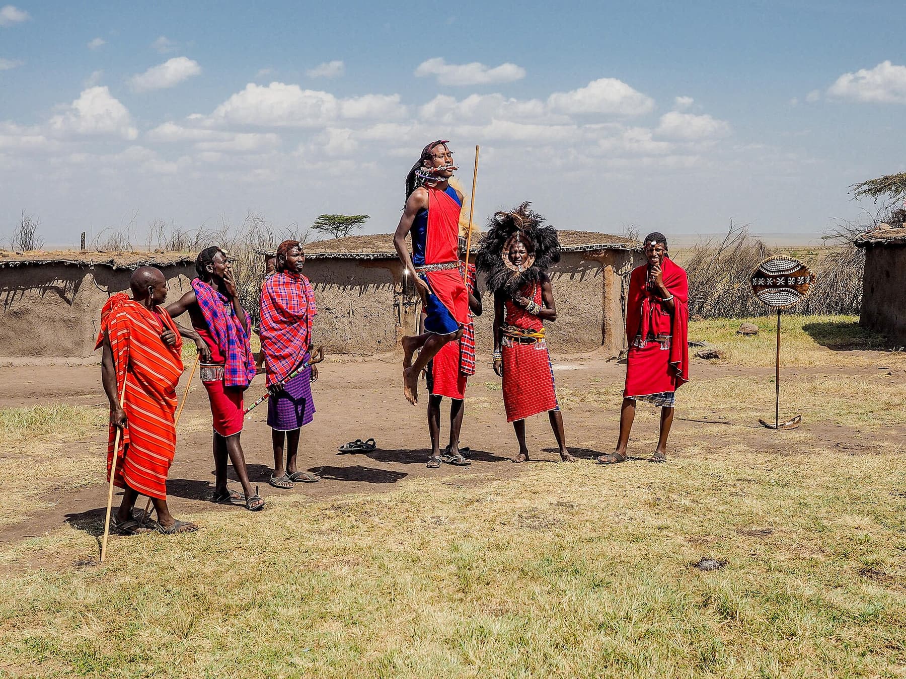 Travellers and Maasai hosts together at a cultural visit