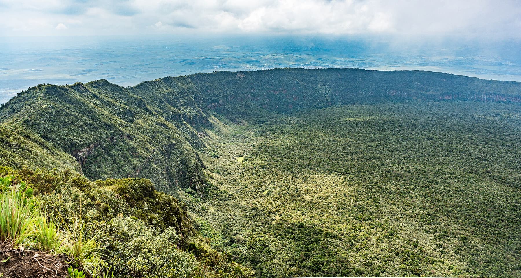 Hikers on the crater rim of Mount Longonot