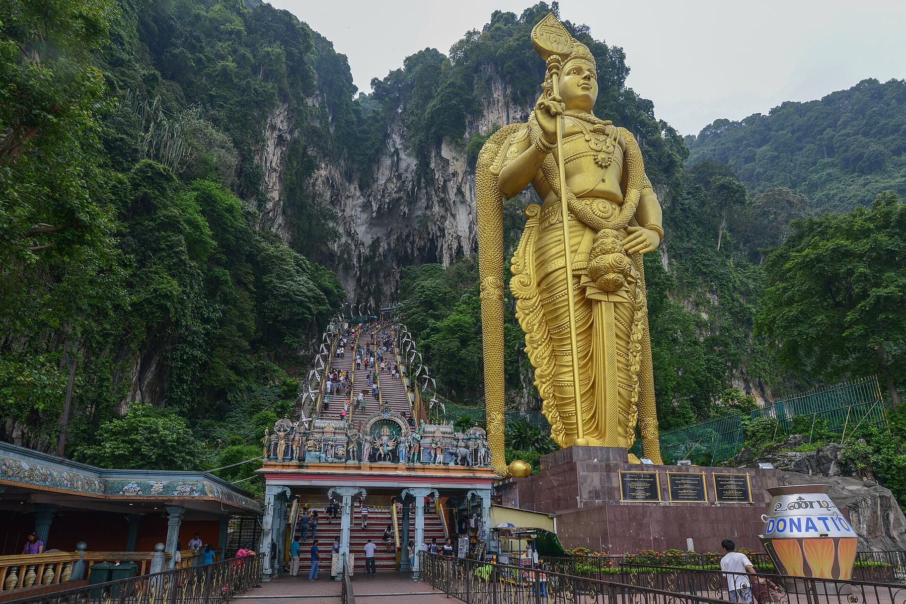 The rainbow steps and golden statue at the Batu Caves