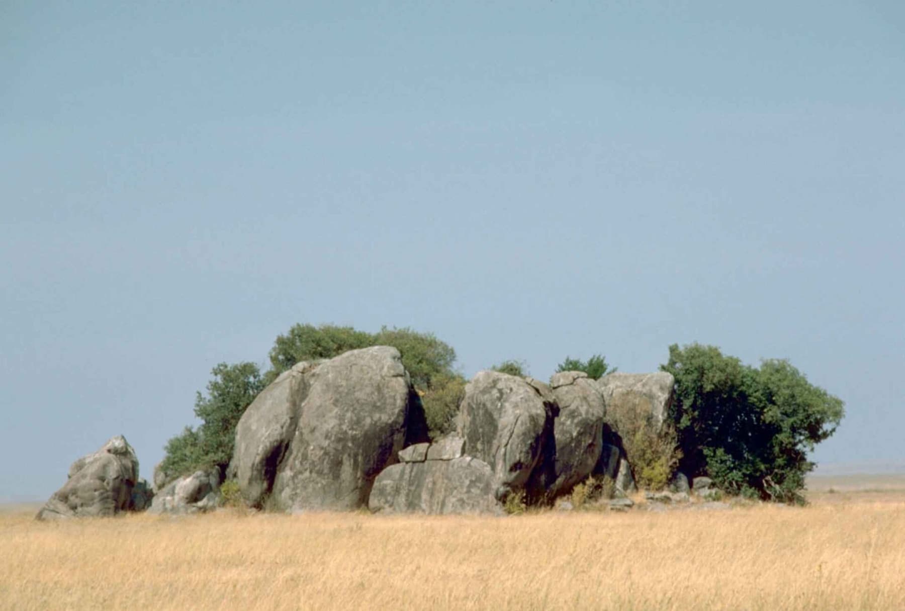 Granite kopjes rising from the Serengeti grassland